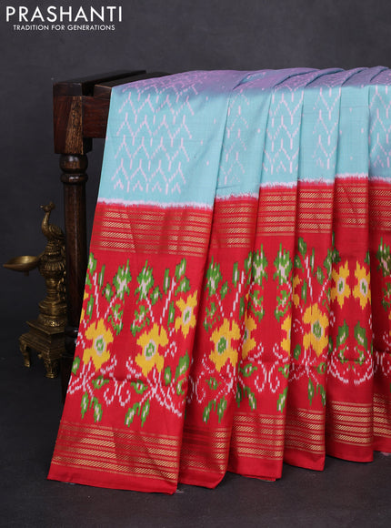 Pochampally silk saree dual shade of teal blue and red with allover ikat weaves and long ikat woven zari border