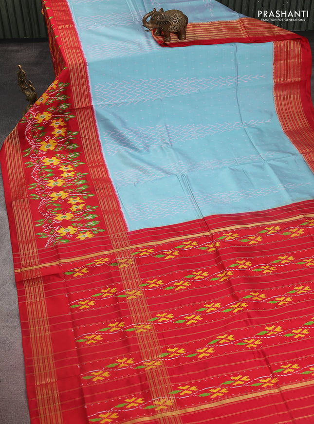 Pochampally silk saree dual shade of teal blue and red with allover ikat weaves and long ikat woven zari border