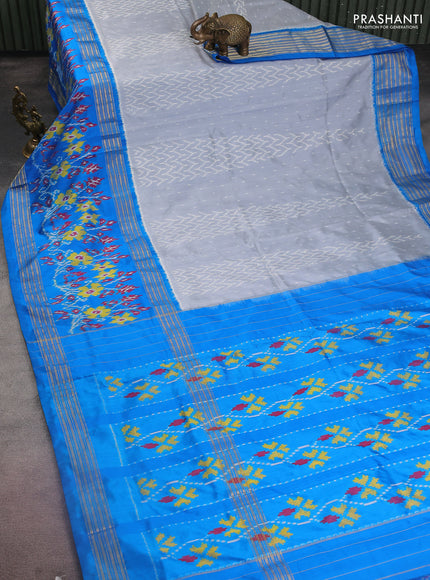 Pochampally silk saree grey and cs blue with allover ikat weaves and long ikat woven zari border
