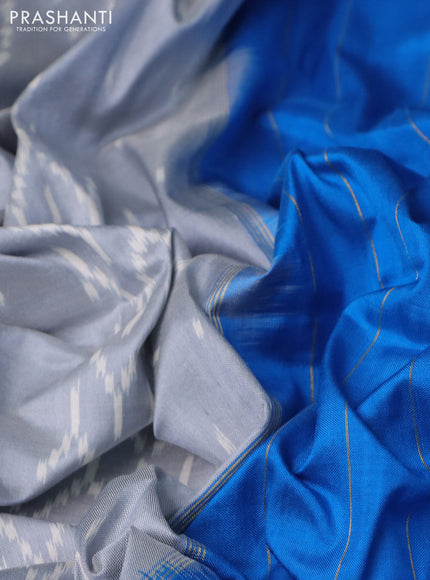 Pochampally silk saree grey and cs blue with allover ikat weaves and long ikat woven zari border