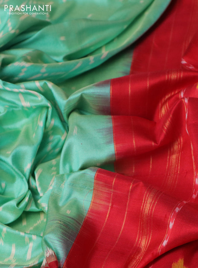 Pochampally silk saree teal green and red with allover ikat weaves and long ikat woven zari border