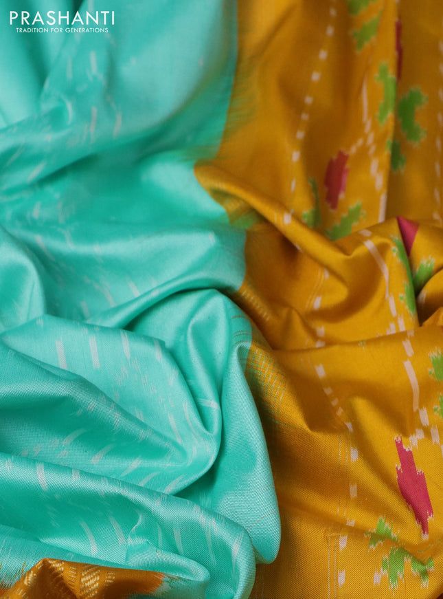 Pochampally silk saree teal blue shade and mustard yellow with allover ikat weaves and long ikat woven zari border