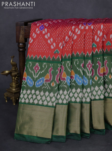 Pochampally silk saree red and green with allover ikat weaves and long ikat woven zari woven border