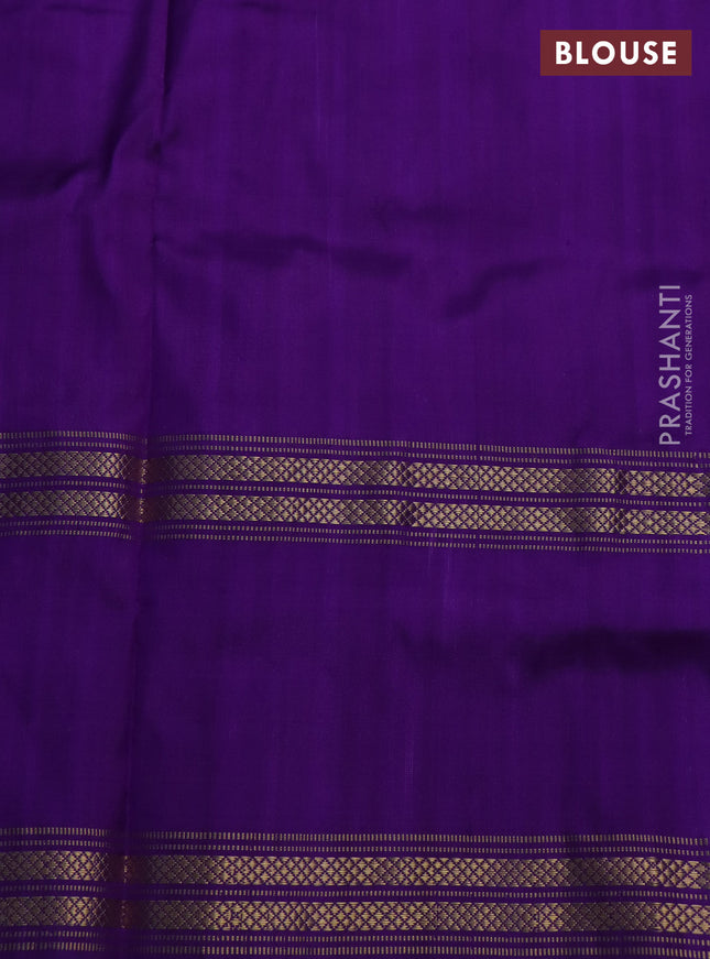 Pochampally silk saree peach orange and violet with allover ikat butta weaves and long ikat woven zari border