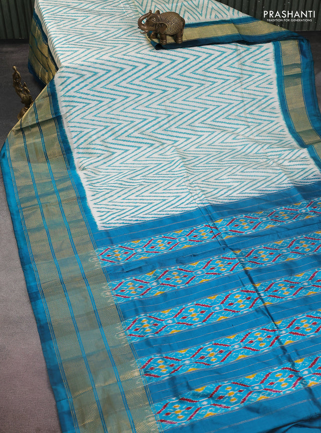 Pochampally silk saree cream and peacock green with allover zig zag ikat weaves and long zari woven border