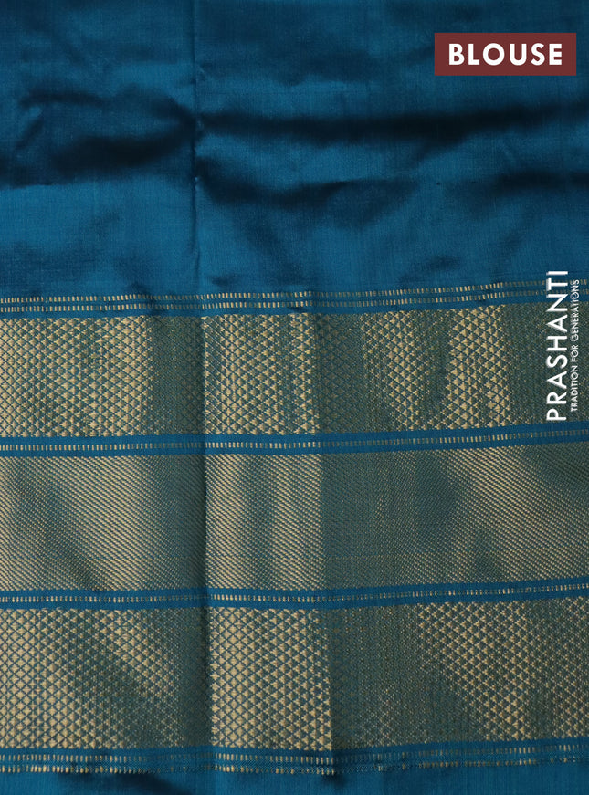 Pochampally silk saree cream and peacock green with allover zig zag ikat weaves and long zari woven border