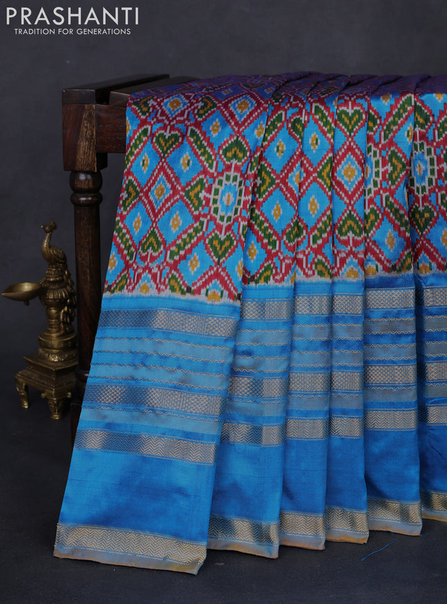 Pochampally silk saree maroon and cs blue with allover ikat weaves and long rettapet zari woven border