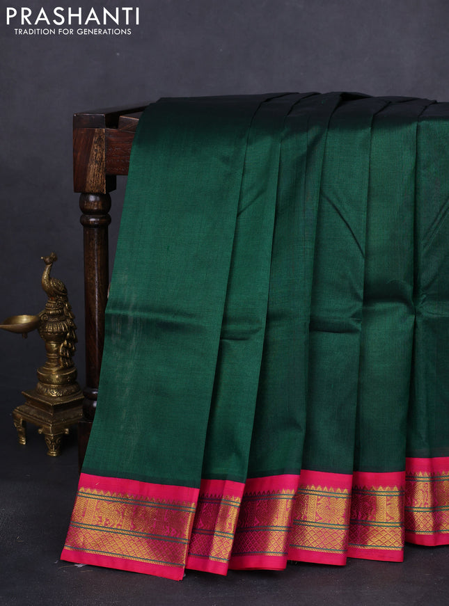 Silk cotton saree green and pink with plain body and zari woven korvai border