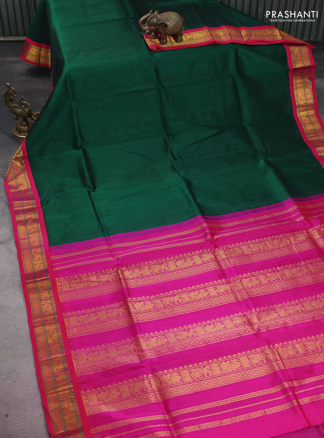 Silk cotton saree green and pink with plain body and zari woven korvai border