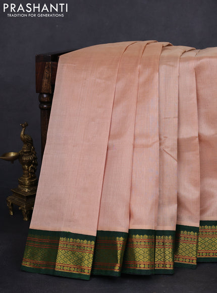 Silk cotton saree sandal and green with plain body and zari woven korvai border