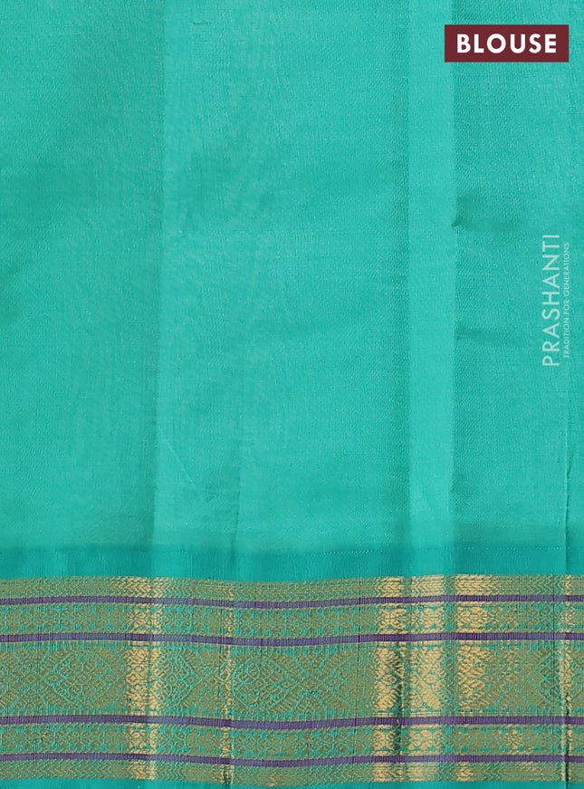 Silk cotton saree cream and teal green with allover zari checks & buttas and zari woven korvai border