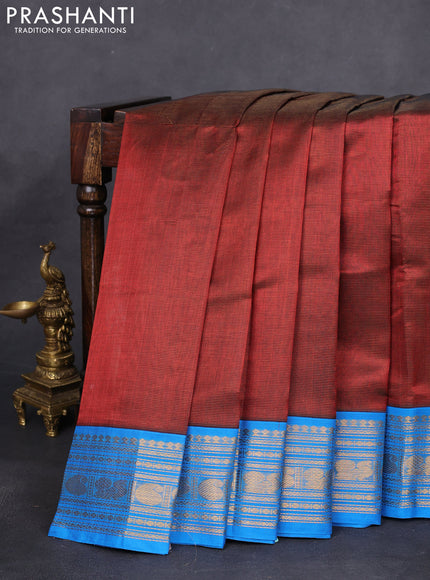 Silk cotton saree rust shade and cs blue with allover vairaosi pattern and zari woven korvai border