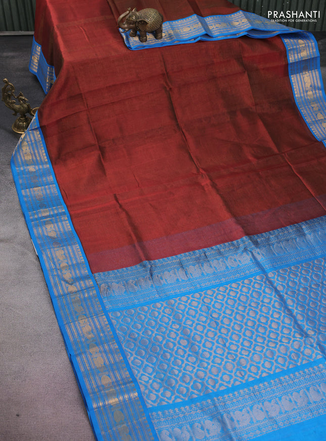 Silk cotton saree rust shade and cs blue with allover vairaosi pattern and zari woven korvai border