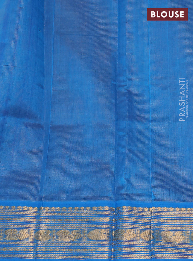 Silk cotton saree rust shade and cs blue with allover vairaosi pattern and zari woven korvai border