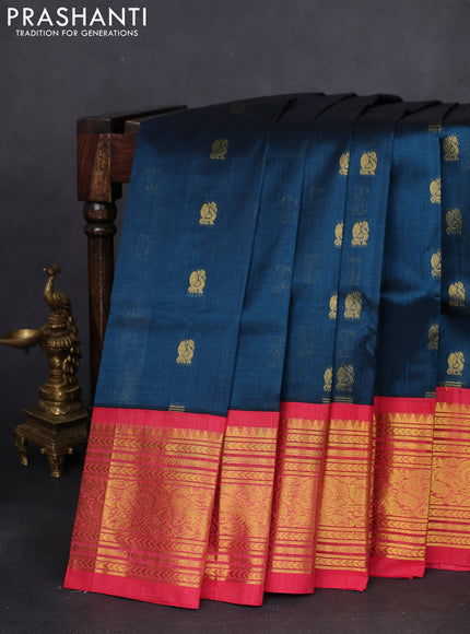 Silk cotton saree peacock blue and peach pink with annam zari woven buttas and zari woven korvai border