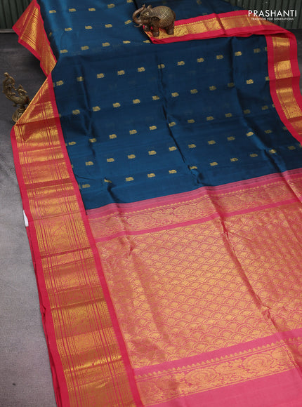Silk cotton saree peacock blue and peach pink with annam zari woven buttas and zari woven korvai border