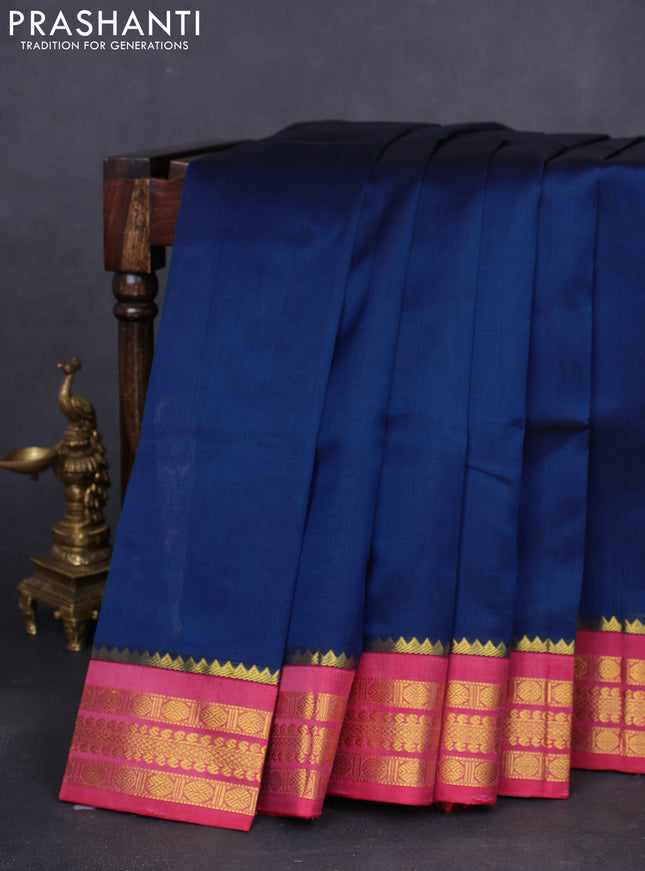 Kuppadam silk cotton saree peacock blue and maroon shade with plain body and zari woven border