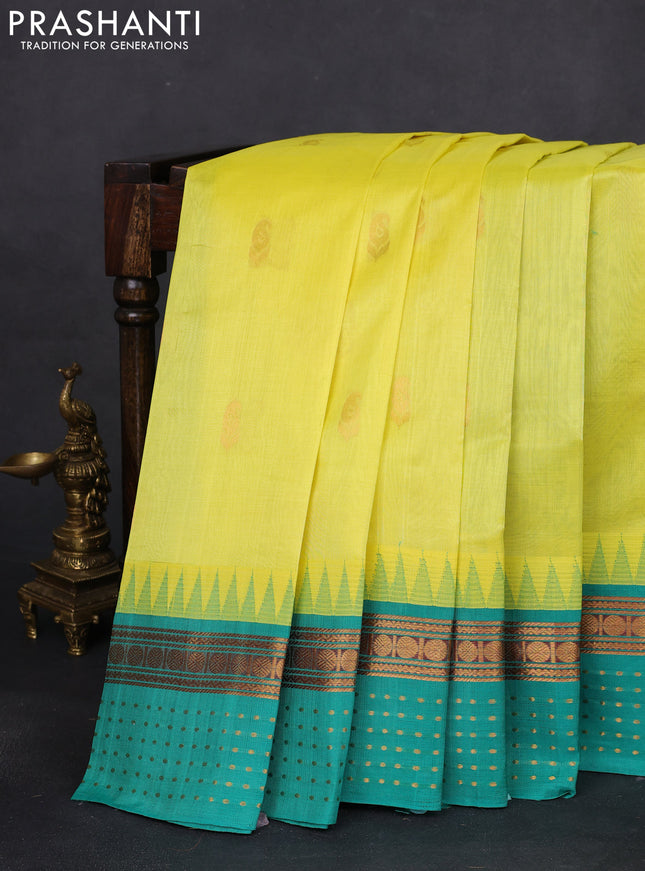 Kuppadam silk cotton saree lime yellow and teal green with zari woven buttas and temple design zari woven border