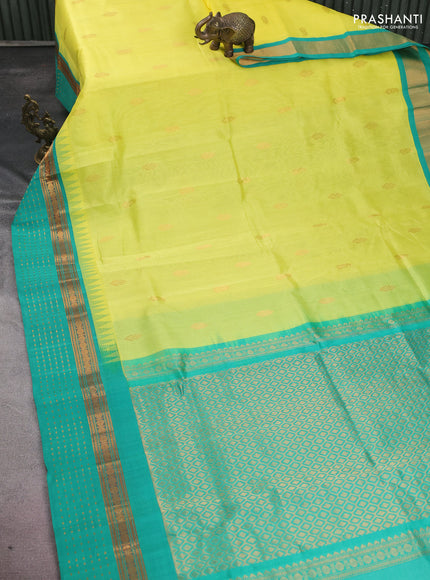 Kuppadam silk cotton saree lime yellow and teal green with zari woven buttas and temple design zari woven border