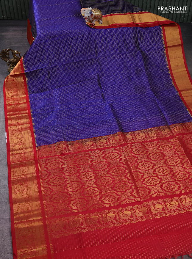 Kuppadam silk cotton saree blue and red with allover zari checks & lakshadeepam weaves and zari woven border