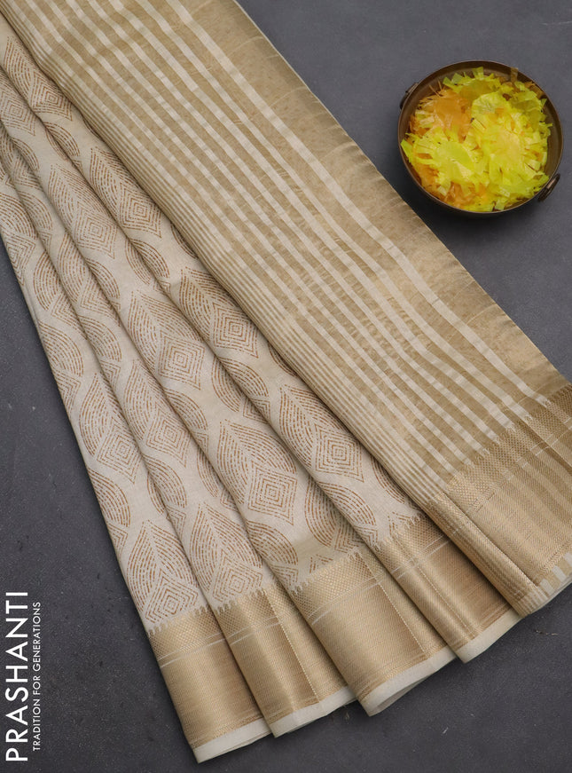 Semi raw silk saree cream with allover butta prints and zari woven border