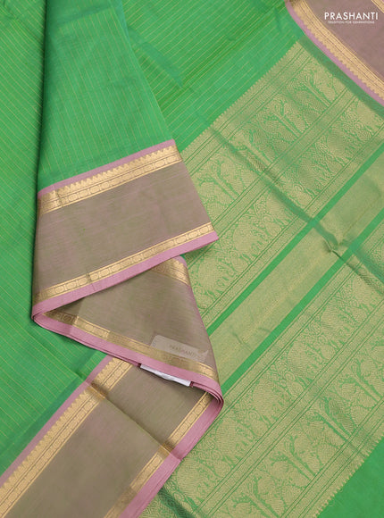 Kanchipuram silk cotton saree light green and light pink with allover zari weaves and zari woven border