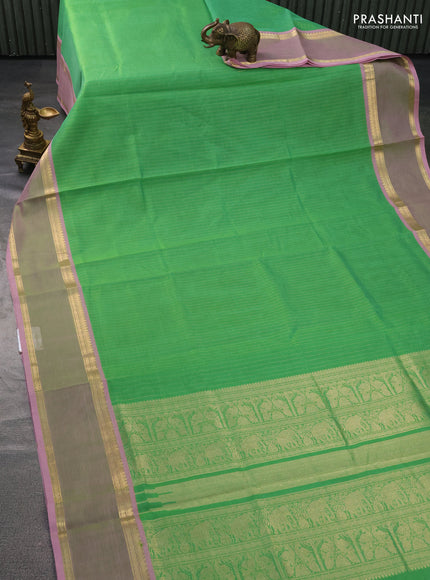 Kanchipuram silk cotton saree light green and light pink with allover zari weaves and zari woven border