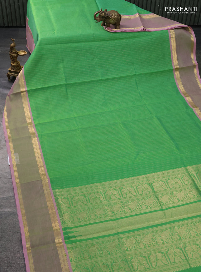 Kanchipuram silk cotton saree light green and light pink with allover zari weaves and zari woven border