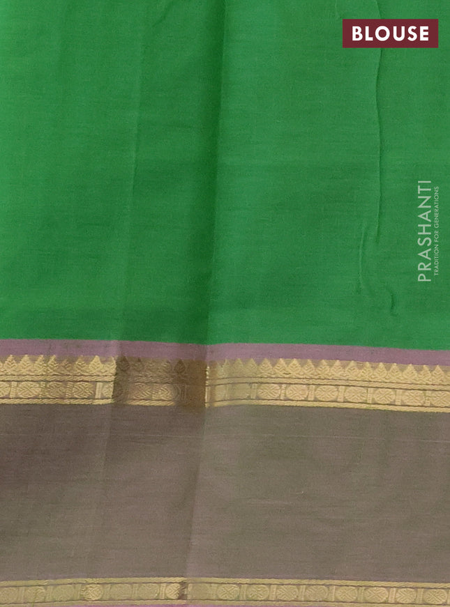 Kanchipuram silk cotton saree light green and light pink with allover zari weaves and zari woven border