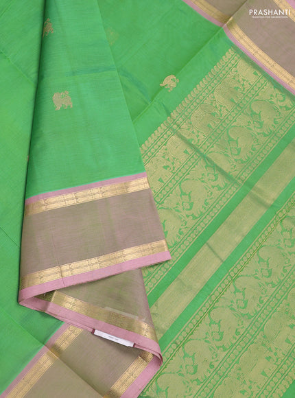 Kanchipuram silk cotton saree light green and pastel pink with zari woven buttas and rettapet zari woven border