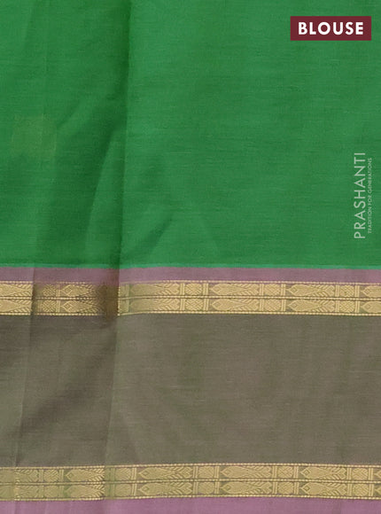 Kanchipuram silk cotton saree light green and pastel pink with zari woven buttas and rettapet zari woven border