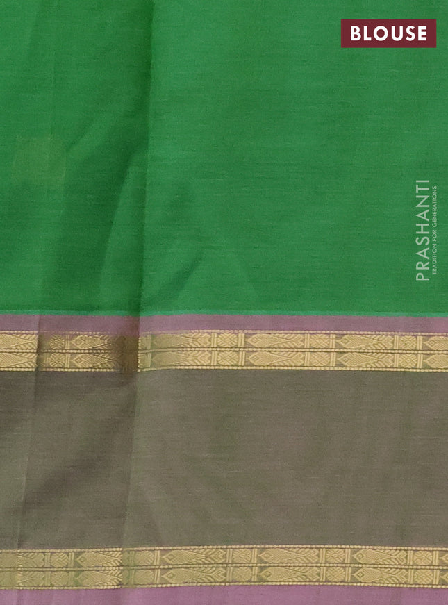 Kanchipuram silk cotton saree light green and pastel pink with zari woven buttas and rettapet zari woven border