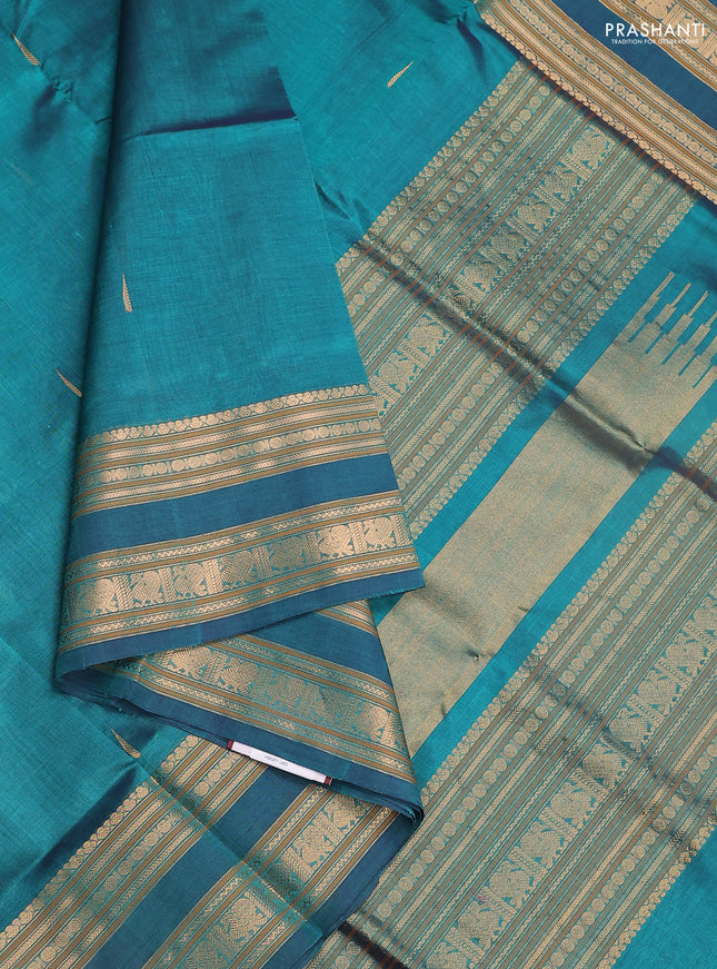 Kanchipuram silk cotton saree peacock green with zari woven buttas and zari woven border