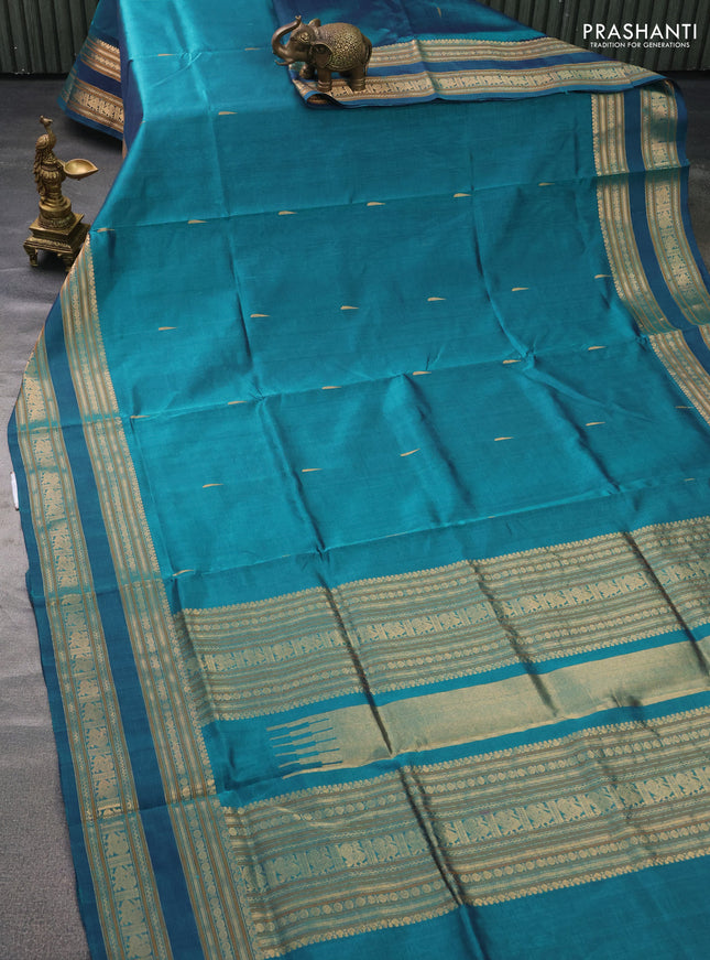 Kanchipuram silk cotton saree peacock green with zari woven buttas and zari woven border