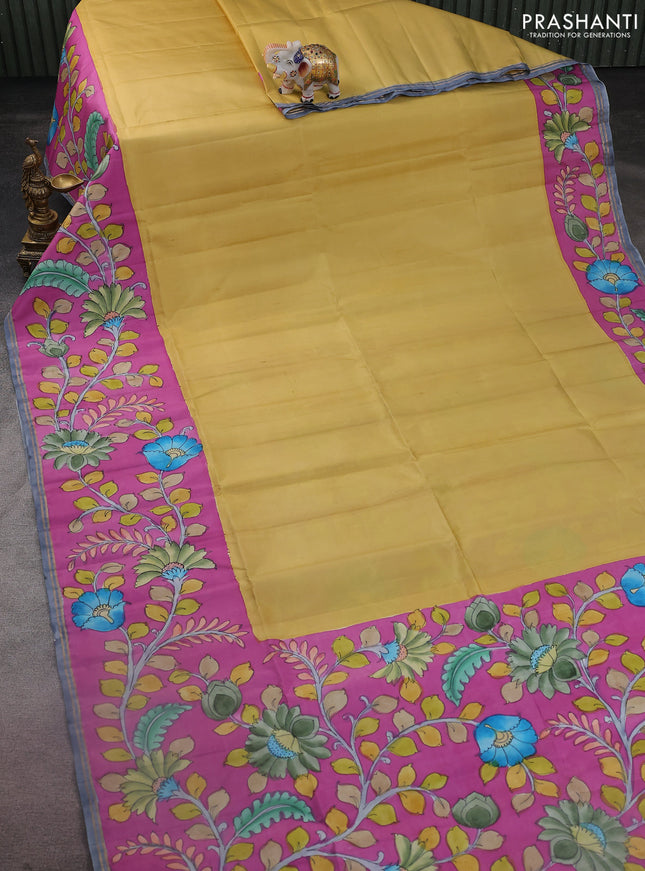 Pure soft silk saree pale yellow and magenta pink with plain body and kalamkari hand painted border & pallu