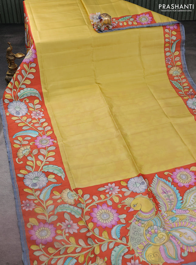 Pure soft silk saree mustard shade and orange with plain body and kalamkari hand painted border & pallu