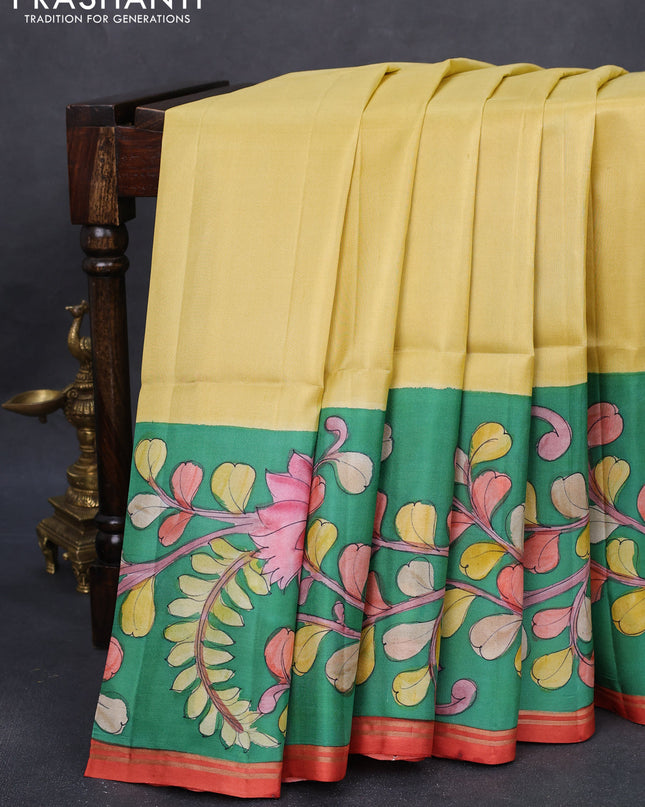 Pure soft silk saree mustard shade and green with plain body and kalamkari hand painted pallu