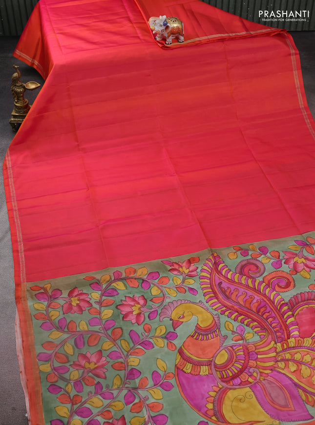 Pure soft silk saree dual shade of pinkish orange and pastel green with plain body and kalamkari hand painted pallu