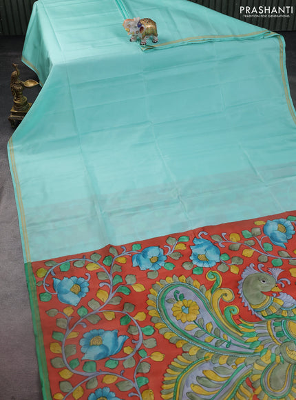Pure soft silk saree teal shade and dark peach orange with plain body and kalamkari hand painted pallu