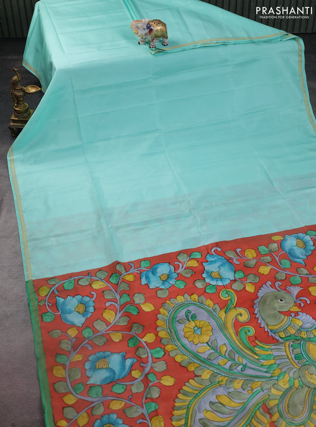 Pure soft silk saree teal shade and dark peach orange with plain body and kalamkari hand painted pallu