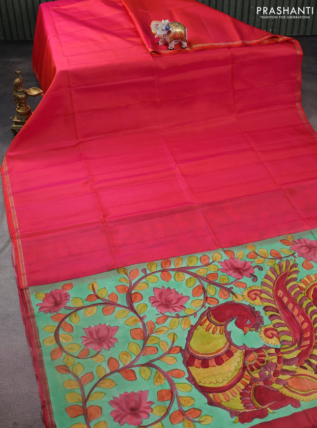 Pure soft silk saree dual shade of pinkish orange and pastel green with plain body and kalamkari hand painted pallu
