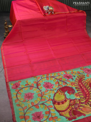 Pure soft silk saree dual shade of pinkish orange and pastel green with plain body and kalamkari hand painted pallu