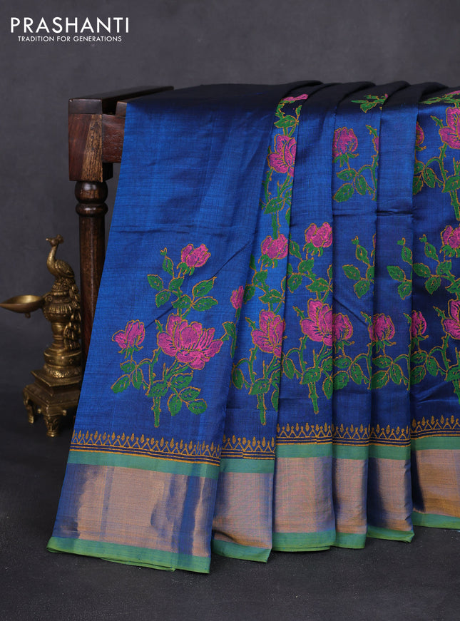 Silk cotton block printed saree peacock blue and light green with floral prints and zari woven border