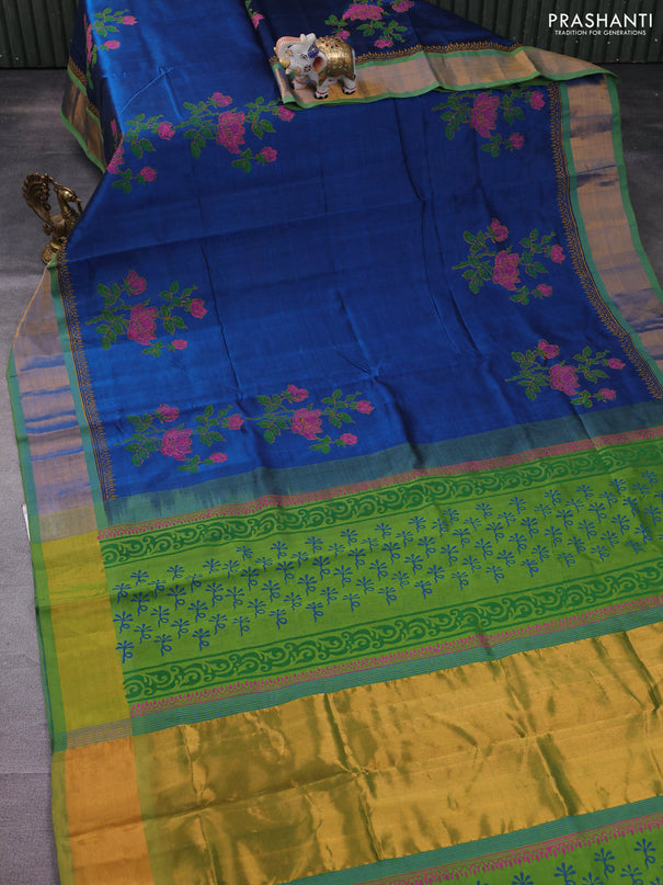 Silk cotton block printed saree peacock blue and light green with floral prints and zari woven border
