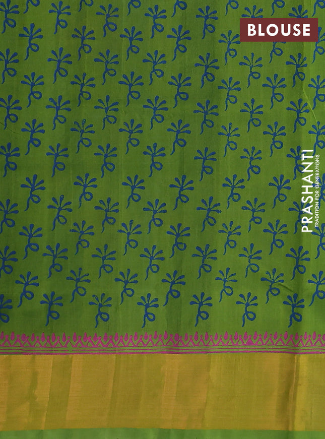 Silk cotton block printed saree peacock blue and light green with floral prints and zari woven border