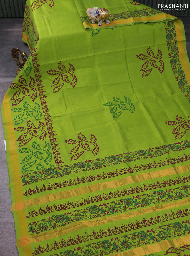 Silk cotton block printed saree light green with leaf prints and zari woven border