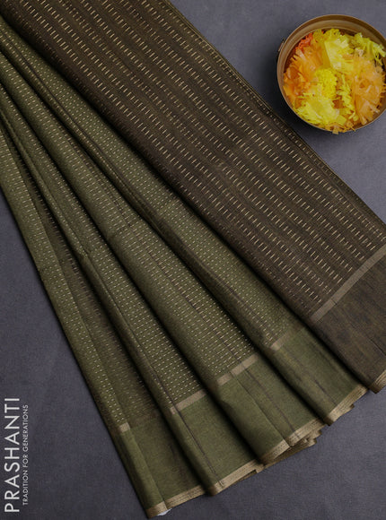 Semi matka saree sap green with allover zari weaves and rettapet zari woven border