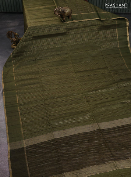 Semi matka saree sap green with allover zari weaves and rettapet zari woven border