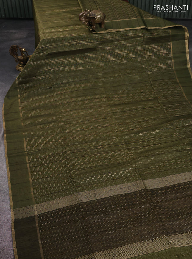 Semi matka saree sap green with allover zari weaves and rettapet zari woven border