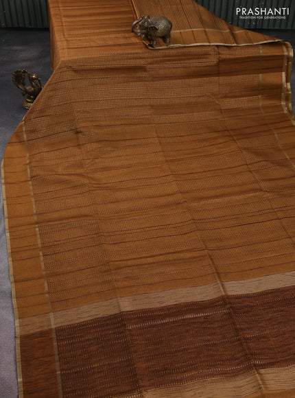 Semi matka saree dark mustard with allover zari weaves and rettapet zari woven border